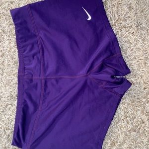 Purple Nike spandex shorts